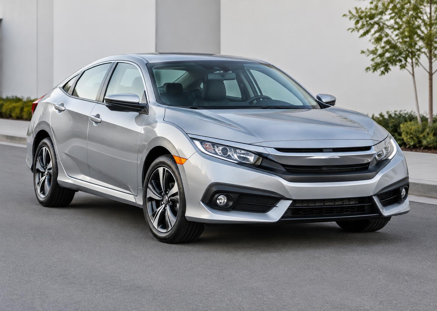 Silver 2018 Honda Civic sedan on a clean street